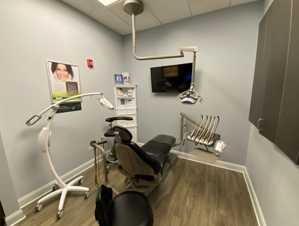 patient room with a operating chair and dental tools at diamond dental service